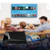 Family using the vSeeBox V5 Pro Android hardware device with a home display